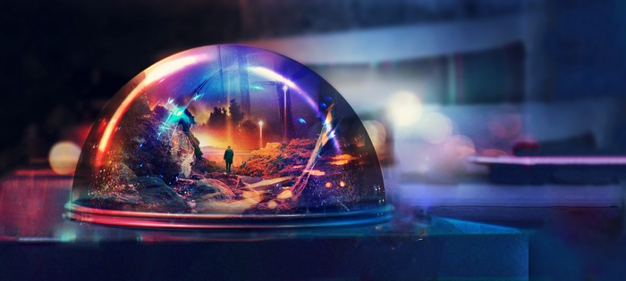 A person stands inside a glowing snow globe