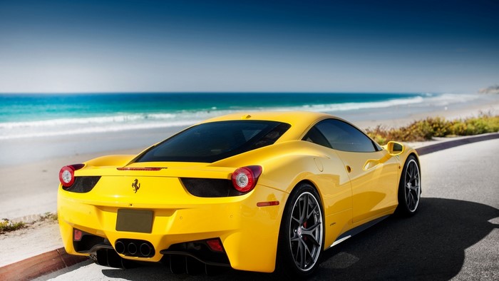 Yellow Ferrari 458 Italia on a Beach Road