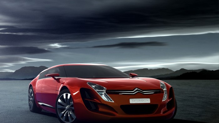 Red Citroen C Metisse concept car on a desolate landscape