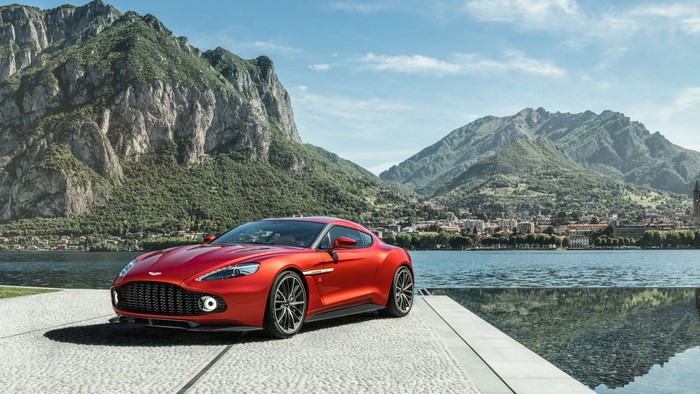 Red Aston Martin Vanquish Zagato by a lake