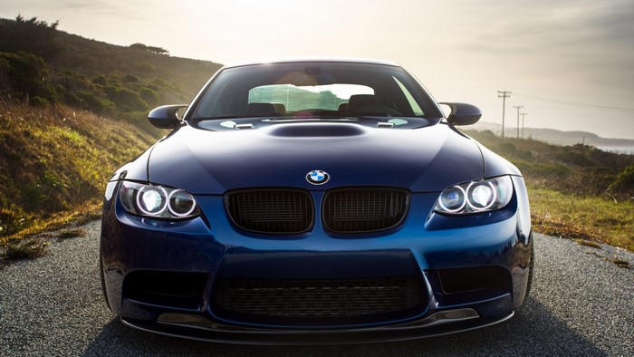 Blue BMW M3 E92 on a road