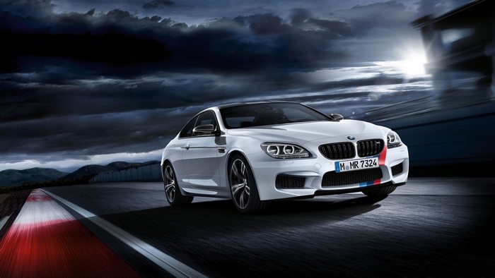 White BMW M6 Coupe on a Racetrack