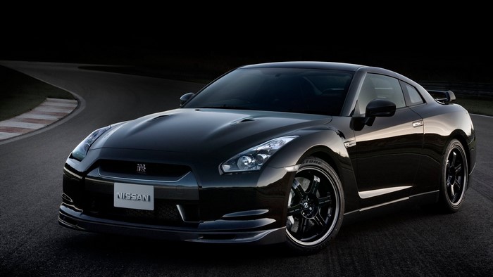 Black Nissan GT-R Spec V on a Racetrack