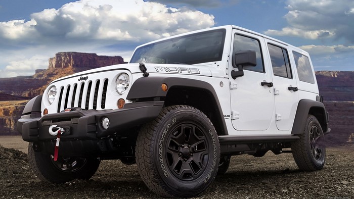 White Jeep Wrangler Moab in a desert landscape