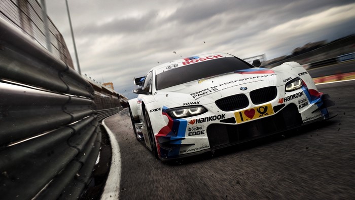 White BMW M Performance Race Car on Track