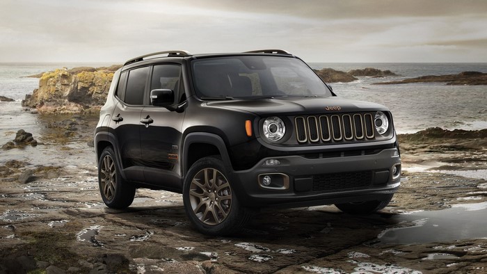 Black Jeep Renegade on rocky shore