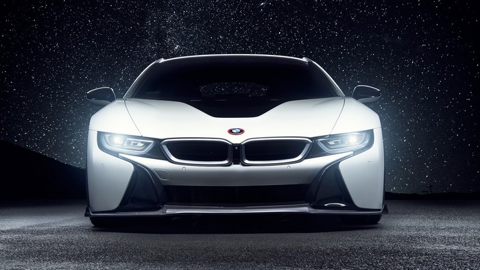 White BMW i8 with Vorsteiner aero kit under starry sky