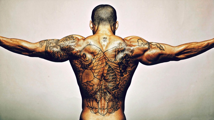 Man with full back tattoo