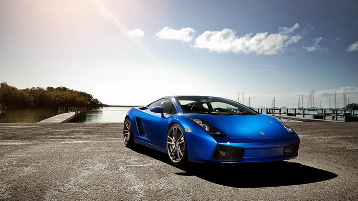 Blue Lamborghini Gallardo LP560-4 by the water