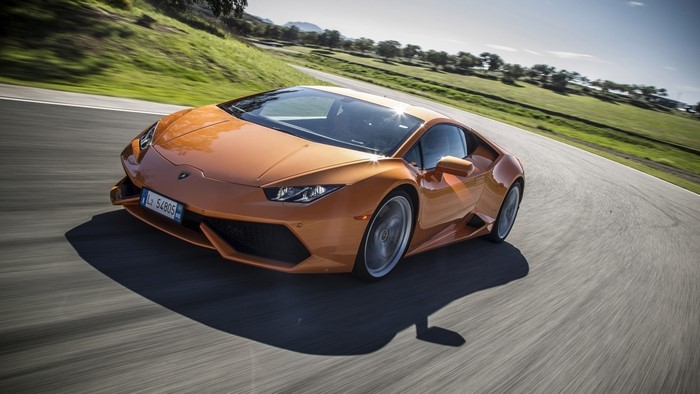 Orange Lamborghini Huracan Lp610 4 on a Racetrack