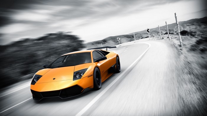 Orange Lamborghini Murcielago Lp670 on a Winding Road