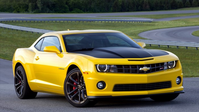 Yellow Chevrolet Camaro Bumblebee on a Racetrack