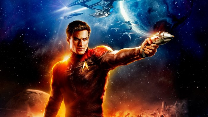 Captain Kirk from Star Trek holding a phaser
