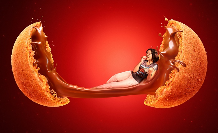 Woman eating cookie with chocolate splash 4K