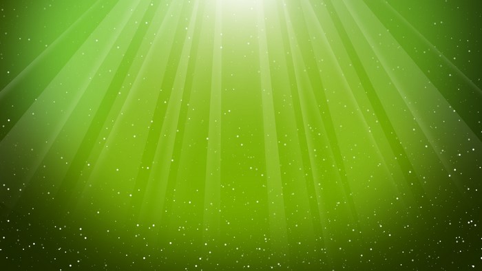 Light rays on a green background with sparkles