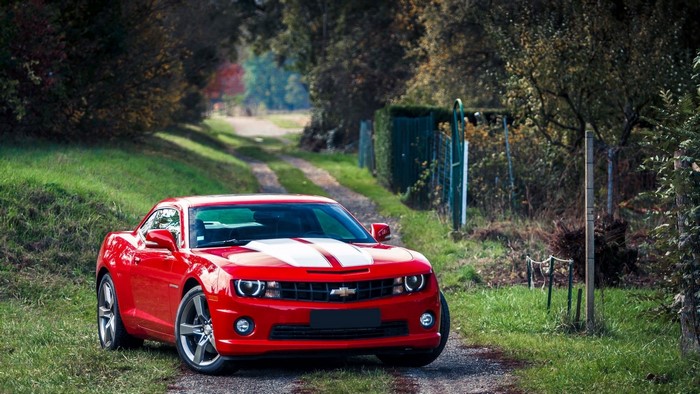 Red Chevrolet Camaro with White Stripes