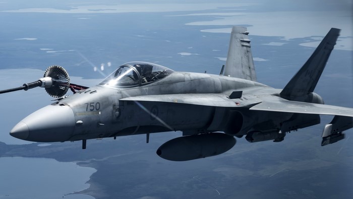 Mcdonnell Douglas FA-18 Hornet refueling in flight