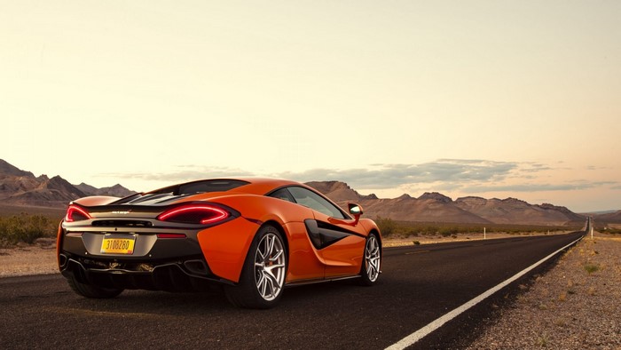 Orange McLaren 570S on a Desert Road