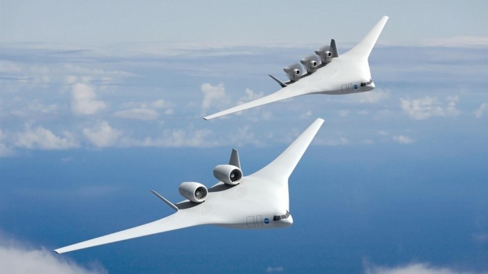 Two NASA experimental aircraft flying in the sky