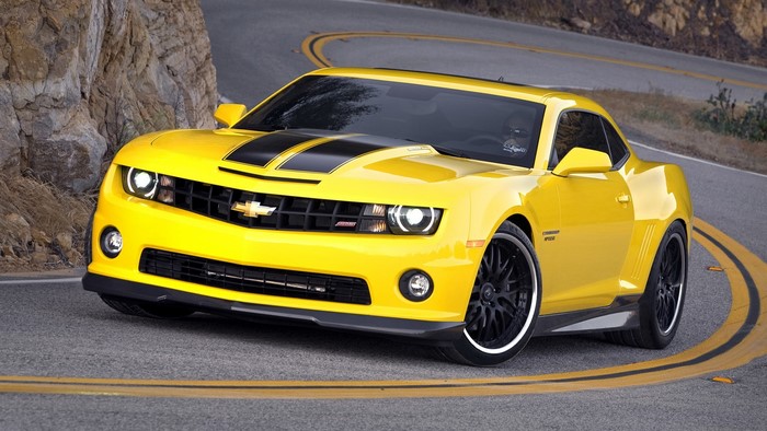 Yellow Chevrolet Camaro Bumblebee on a Winding Road