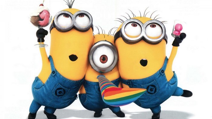 Minions from Despicable Me holding drinks and a party horn