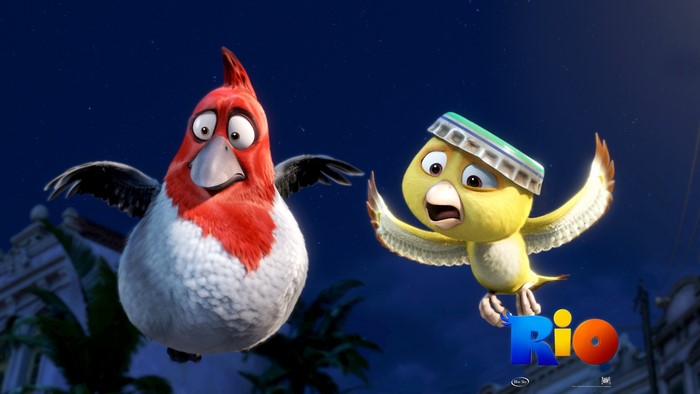 Two birds from the movie Rio flying at night