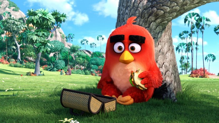 Red from The Angry Birds Movie eating a sandwich