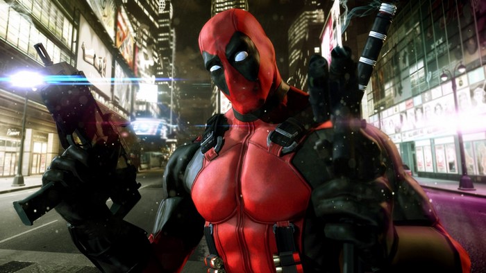 Deadpool holding a gun in a city at night