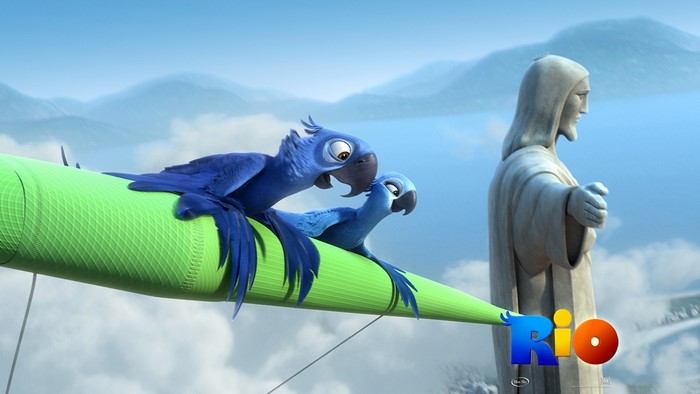 Blu and Jewel from Rio on a green structure