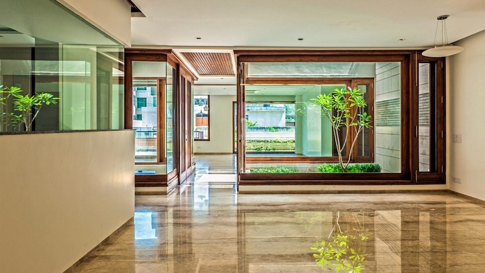 Modern house interior with large windows and marble floors