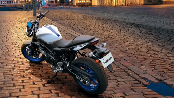 Suzuki SV650 Motorcycle on Cobblestone Street