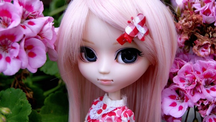 Cute doll with pink hair and flowers