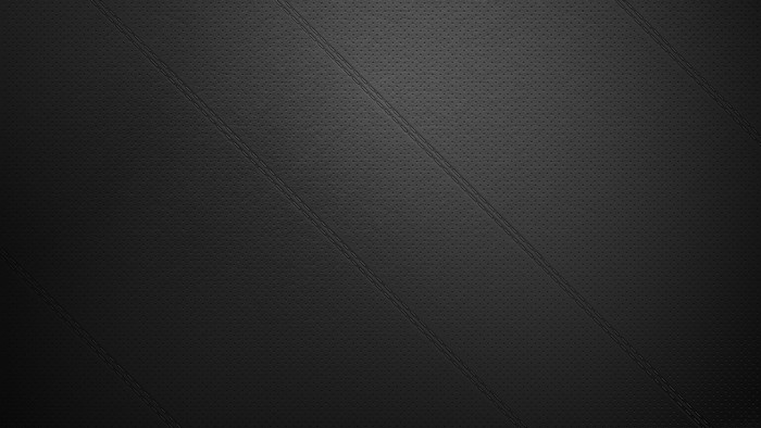 Black stitched perforated leather texture