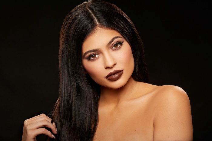 Kylie Jenner with dark hair and dark lipstick
