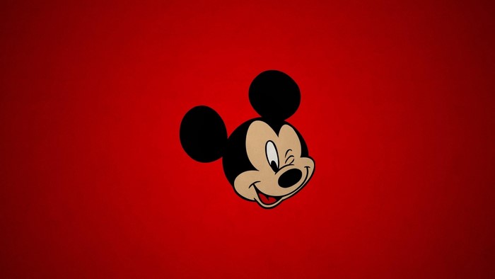 Mickey Mouse face on red background