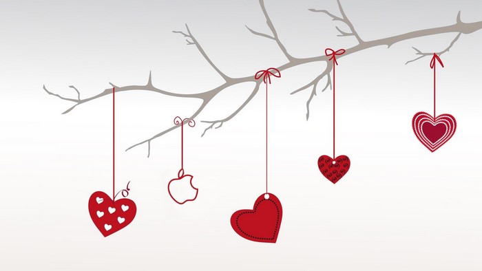 Hearts and Apple logo hanging from a tree branch