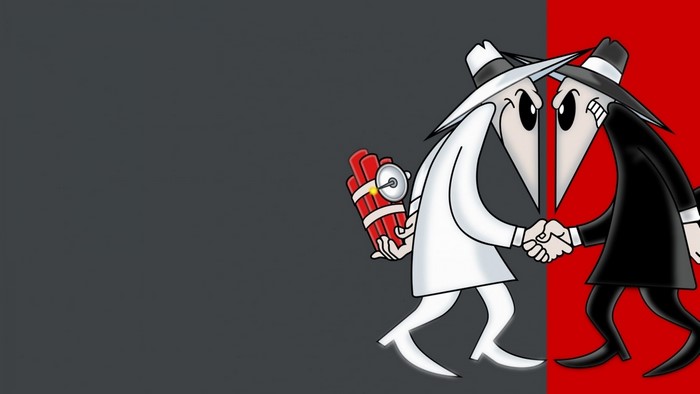 Spy vs. Spy cartoon characters shaking hands with dynamite