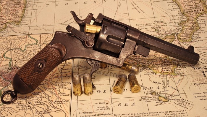 Revolver and Cartridges on Old Map