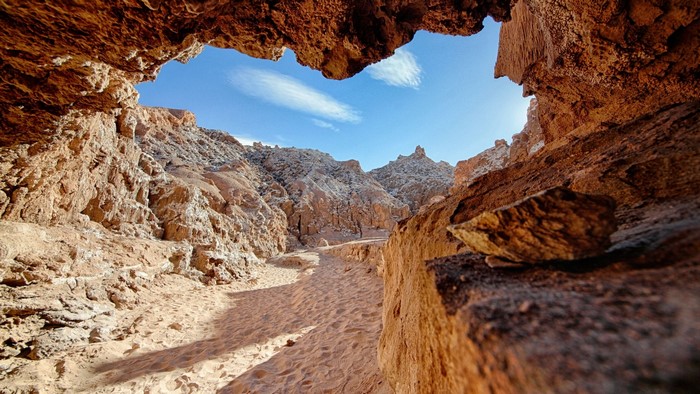 Cave entrance in a desert landscape