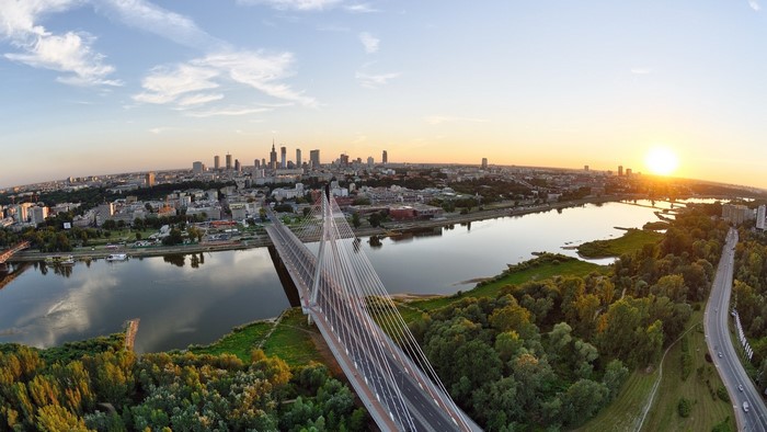 Siekierkowski Bridge over Vistula River in Warsaw, Poland at sunset