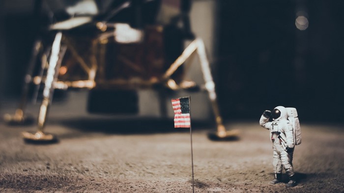 Astronaut Saluting American Flag on the Moon