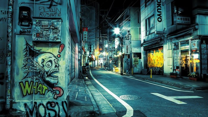 Graffiti on a Tokyo street at night