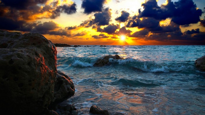 Sea Sunset with Rocks and Clouds
