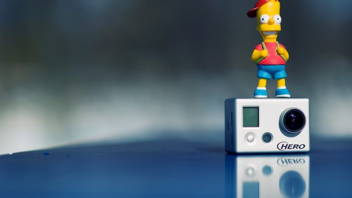 Bart Simpson toy on a GoPro Hero camera