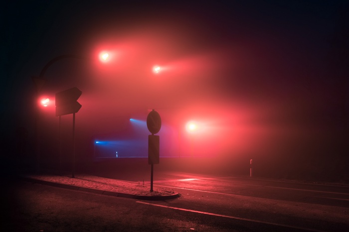 Traffic lights in fog at night