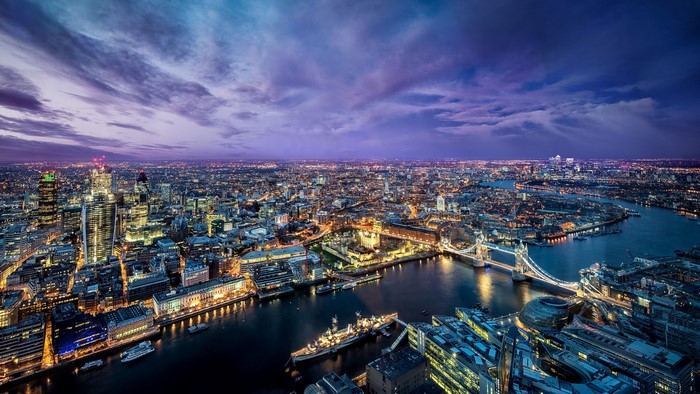 Aerial View of London at Night with Tower Bridge