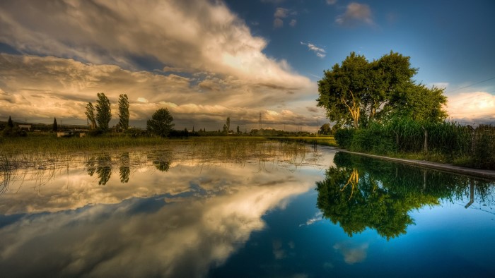 Dramatic Sky and Water Reflection