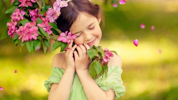 Girl with pink flowers in her hair