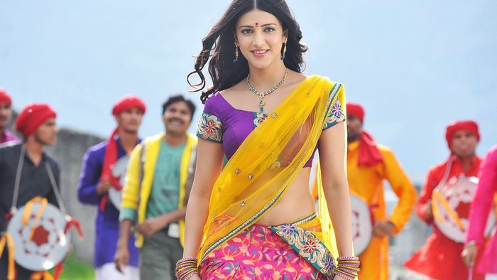 Shruti Hassan in a yellow and purple sari