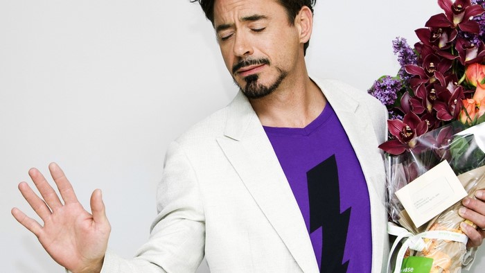 Robert Downey Jr. holding flowers